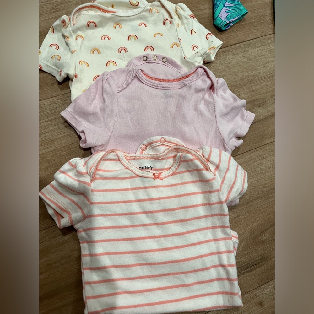 7 summer time onesies! Short sleeve and sleeveless. 18-34 months carters.